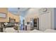 Well-equipped kitchen with stainless steel appliances and light wood cabinets at 6232 Crickethollow Dr, Riverview, FL 33578