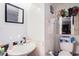 Functional bathroom with a sink, mirror, and toilet; some repairs needed at 702 Regent S Cir, Brandon, FL 33511