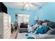 Bright bedroom featuring light blue walls and a closet with sliding doors at 702 Regent S Cir, Brandon, FL 33511