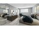 Serene main bedroom featuring neutral walls, tile floors, and a mirrored closet door for added space at 7123 Cherry Laurel Dr, Port Richey, FL 34668