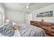 Comfortable bedroom boasting wood floors, rustic dresser, and modern décor at 734 Lake Forest Rd, Clearwater, FL 33765