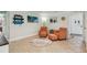 Living room with decorative wall hangings and furnishings at 734 Lake Forest Rd, Clearwater, FL 33765