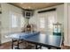 Community game room with table tennis, jukebox, flat screen TV, popcorn machine, and bright light at 7410 Ambleside Dr, Land O Lakes, FL 34637