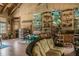 Spacious nature center interior with comfortable seating, displays, and natural light for relaxing at 7410 Ambleside Dr, Land O Lakes, FL 34637