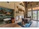 Inviting lobby area with nature-themed decor, murals, and seating for relaxation at 7410 Ambleside Dr, Land O Lakes, FL 34637