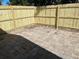 Spacious patio area featuring pavers, perfect for entertaining and relaxation in a private backyard setting at 7415 San Moritz Dr, Port Richey, FL 34668