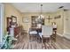 Elegant dining room with a classic hutch and stylish decor at 7924 Singing Court Pl, Tampa, FL 33615