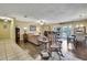 Cozy living room with warm wood floors and natural light at 7924 Singing Court Pl, Tampa, FL 33615