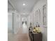 Inviting foyer showcasing neutral walls, tile flooring, and decorative accents at 8508 Bay Dr, Spring Hill, FL 34606