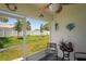 Relaxing screened porch with a view of the fenced backyard at 8508 Bay Dr, Spring Hill, FL 34606