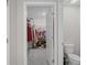 Bright walk-in closet featuring ample storage with shelving and racks for organized wardrobe and shoe display at 8508 Bay Dr, Spring Hill, FL 34606