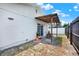 Backyard featuring a covered patio and fully fenced yard at 8708 Albion Ct, Tampa, FL 33634