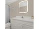 Bathroom featuring a vanity with white cabinets and modern sink at 8708 Albion Ct, Tampa, FL 33634
