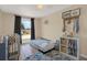 Cozy Bedroom with decor and plenty of natural light from the window at 8708 Albion Ct, Tampa, FL 33634