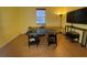 A well-lit office space with a large desk, suitable for working from home at 9126 Lantern Oak Way, Land O Lakes, FL 34638