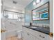 Stylish bathroom featuring a shower/tub combination and modern vanity with granite countertops at 9226 41St N St, Pinellas Park, FL 33782