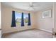 Bright bedroom features carpet flooring and natural light at 9226 41St N St, Pinellas Park, FL 33782