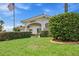 Community clubhouse featuring well-manicured lawns, mature landscaping, and inviting architecture at 9226 41St N St, Pinellas Park, FL 33782