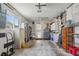 Functional garage space with ample storage, tool racks, and access to the house at 9226 41St N St, Pinellas Park, FL 33782