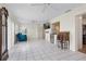 Spacious living room featuring tile floors, ceiling fans, and an open layout at 9226 41St N St, Pinellas Park, FL 33782