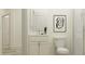 Serene bathroom featuring white cabinetry, marble countertops, and a glass-enclosed shower at 9486 Gladsome Dr, Land O Lakes, FL 34637