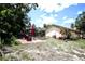 The cozy backyard has a screened pool, patio, perfect for summer fun and relaxation at 11411 N 19Th St, Tampa, FL 33612