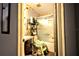 Bathroom featuring a shower with sliding glass doors, storage shelves, and updated fixtures at 11411 N 19Th St, Tampa, FL 33612