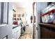 Bright bathroom features, a shower, a large mirror, decor, and a vanity with gold fixtures at 11411 N 19Th St, Tampa, FL 33612