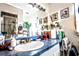 Bright bathroom with a shower, a large mirror, decor, and a stylish vanity with gold fixtures at 11411 N 19Th St, Tampa, FL 33612