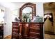 Bedroom showcasing a dresser, wood floors, and ample natural light for a bright and airy feel at 11411 N 19Th St, Tampa, FL 33612