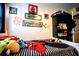 Themed bedroom with colorful decor and plenty of stuffed animal friends at 11411 N 19Th St, Tampa, FL 33612