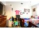 This bedroom includes two beds, a small television, and a colorful decor at 11411 N 19Th St, Tampa, FL 33612