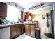 Traditional kitchen with granite countertops, tile floors, modern stainless steel appliances and ample cabinet space at 11411 N 19Th St, Tampa, FL 33612