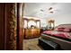 Main bedroom with a ceiling fan and an ornate dresser with mirror at 11411 N 19Th St, Tampa, FL 33612