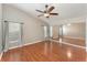 Spacious bedroom with vaulted ceiling, wood floors and mirrored closet doors at 11620 Crest Creek Dr, Riverview, FL 33569