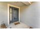 A welcoming entrance featuring a front door with glass panels and a charming 'hello friends' doormat at 11620 Crest Creek Dr, Riverview, FL 33569