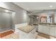 Bright kitchen with granite countertops, island, and stainless steel dishwasher at 11620 Crest Creek Dr, Riverview, FL 33569