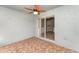 Enclosed patio featuring sliding glass door, tile floor, and ceiling fan at 11620 Crest Creek Dr, Riverview, FL 33569