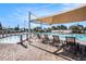 A community pool area offers comfortable seating and shade, ideal for residents to relax and socialize outdoors at 11620 Crest Creek Dr, Riverview, FL 33569