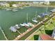 Stunning aerial view of a waterfront property with boat docks and gorgeous water views at 128 1St Street E. # 102, Tierra Verde, FL 33715