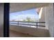 Balcony view showcasing the neighborhood marina with sailboats docked in the clear waterway at 128 1St Street E. # 102, Tierra Verde, FL 33715