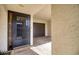 Private entrance with a covered parking space, offering convenient and protected access to the home at 128 1St Street E. # 102, Tierra Verde, FL 33715