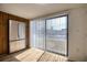 Kitchen featuring stainless steel refrigerator and sliding glass doors to balcony at 128 1St Street E. # 102, Tierra Verde, FL 33715