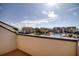 Community pool as seen from the balcony with lounge seating and shade at 128 1St Street E. # 102, Tierra Verde, FL 33715