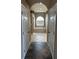 Bright bathroom with tile floors, large tub under a window, and neutral wall colors at 13632 Deventer Ct., Hudson, FL 34667