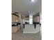 Kitchen showcasing ample counter space, wood cabinetry and modern stainless steel appliances at 13632 Deventer Ct., Hudson, FL 34667