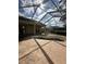 Outdoor patio with enclosed swimming pool, ceiling fans and view of the backyard at 13632 Deventer Ct., Hudson, FL 34667