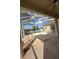 Enclosed patio with covered pool and view of the backyard at 13632 Deventer Ct., Hudson, FL 34667