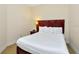 Cozy bedroom featuring comfortable bed and soft lighting at 13941 Clubhouse Dr # 308, Tampa, FL 33618