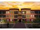 Attractive condo building with balconies and well-maintained landscaping at 13941 Clubhouse Dr # 308, Tampa, FL 33618